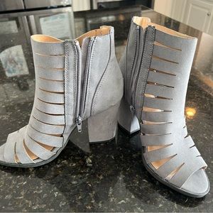 Blueish/gray bootie heels. Never worn